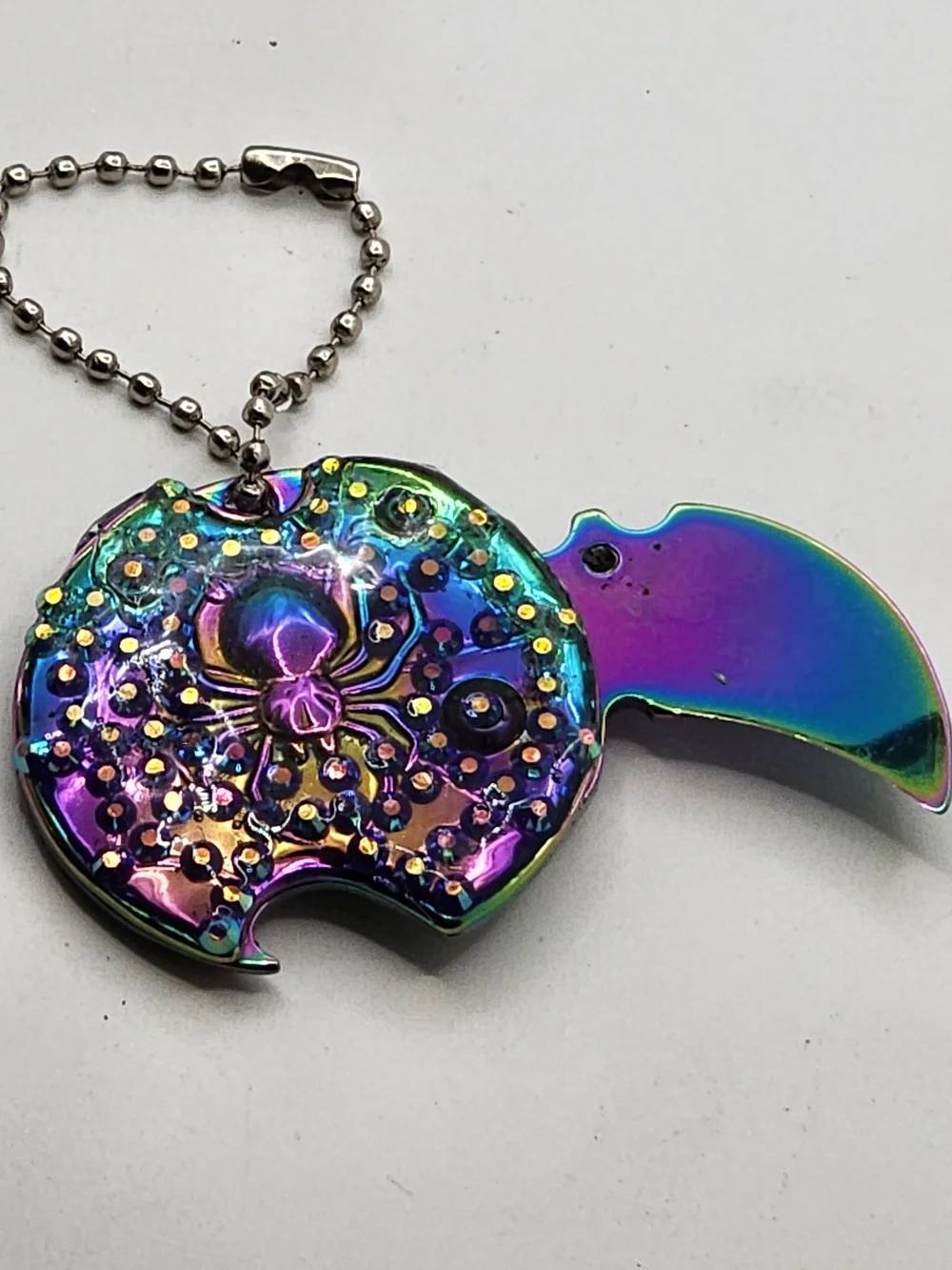 Iridescent Spider Disc Keychain Knife with Crystal Accents